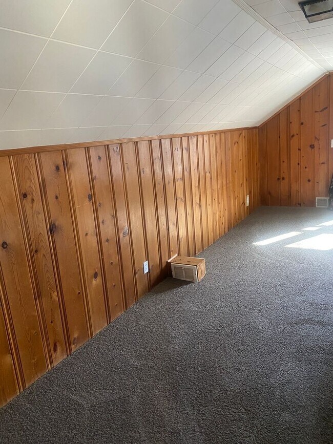 Building Photo - Three bedroom 1 bath bungalow with finished basement and 2 car garage