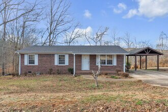 Building Photo - Well maintained 3BR, 1BA single family home with yard, carport and storage shed on quiet road in ...