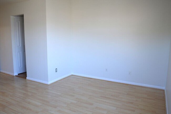 Building Photo - Spacious Three-Bedroom Two-Story Townhome with Garage and Private Yard