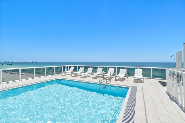 Building Photo - 15811 Collins Ave