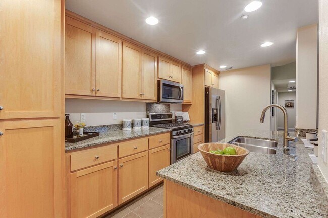 Building Photo - Stunning Top-Floor Condo with Open Layout, Modern Upgrades, and Prime Location 6 MONTH LEASE