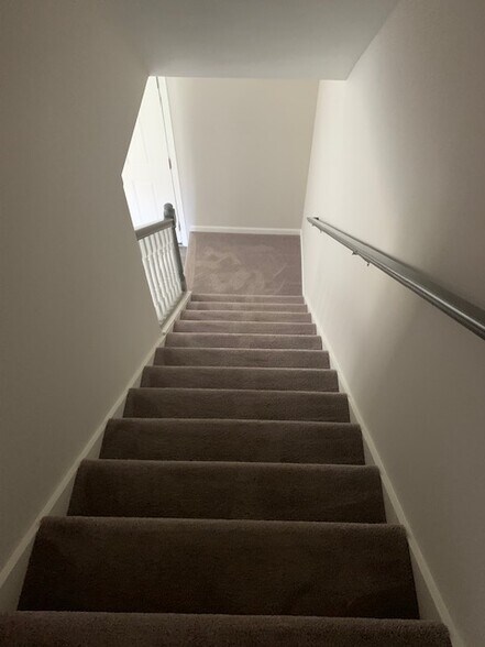 Stairs to main level - 6072 Herons Cir