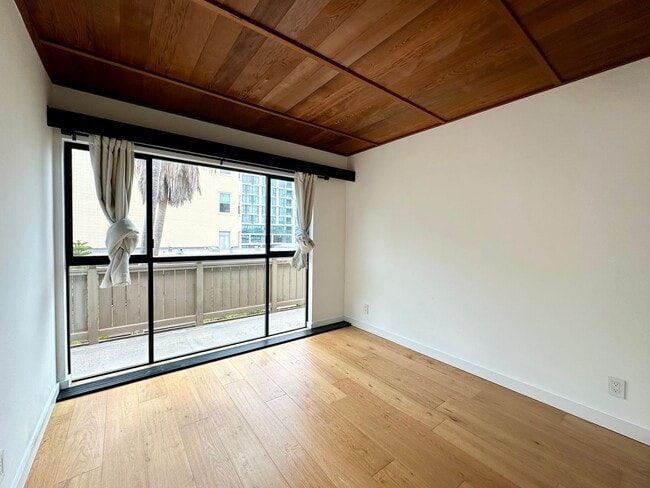 Building Photo - Modern 2BR/1.5BA Two-Level Condo w/ Patio ...