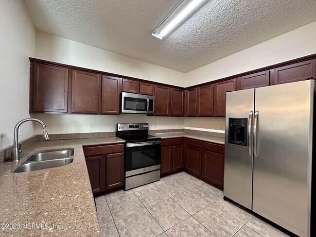Building Photo - 4908 Key Lime Dr