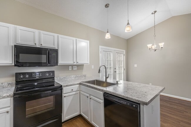 Building Photo - Like New Home off Freeman Mill.  Just Painted, New Wood/Vinyl Flooring, Vaulted Ceilings, Front P...