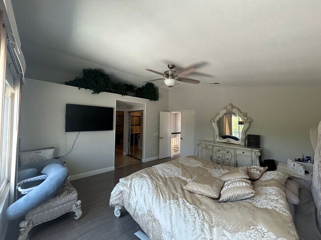 Building Photo - Upgraded 4-Bedroom Home in Gated Green Riv...