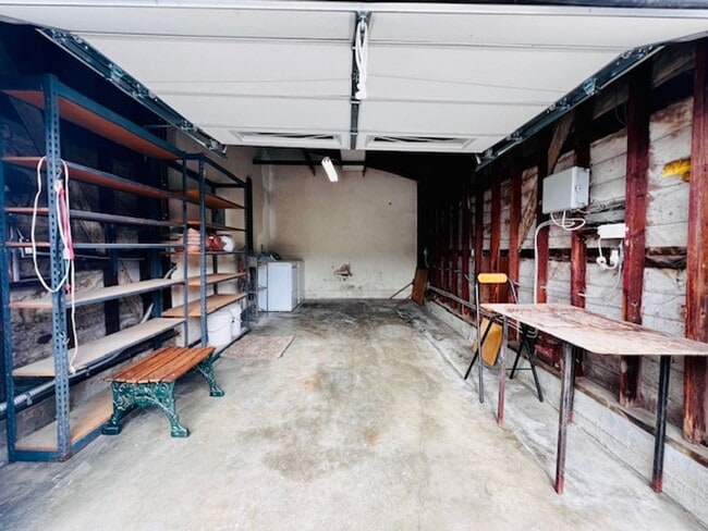 Building Photo - Spacious 2 bedroom 1 bath house for rent with large Garage & off st. parking