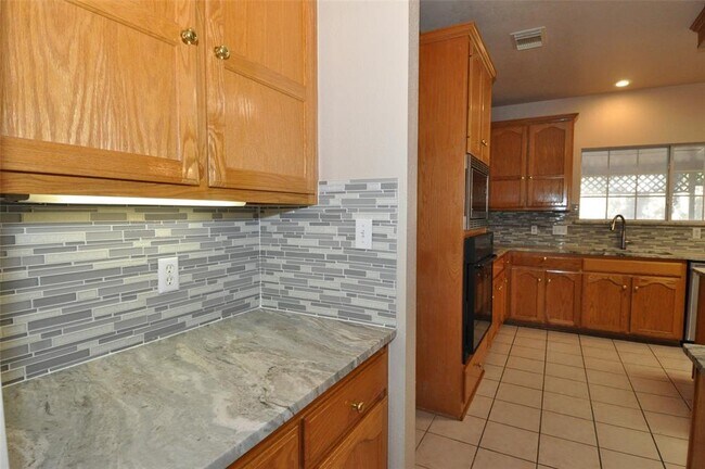 Building Photo - 13304 Bosswood Dr
