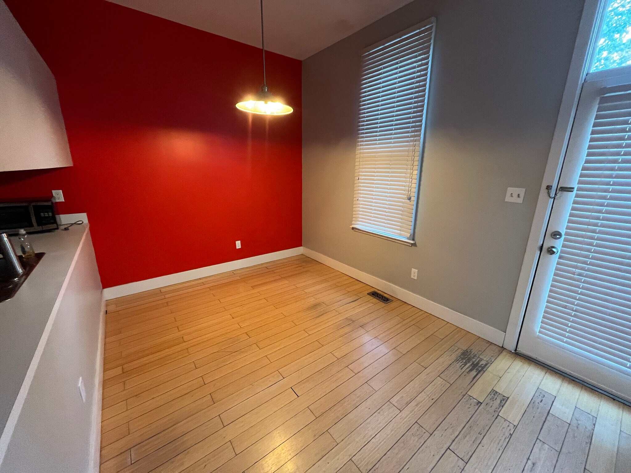 Kitchen unfurnished, door to backyard - 1626 Carroll St