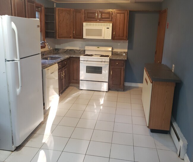 Kitchen with New Granite Countertop - 27 Pine St
