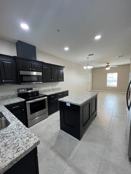Tile floor kitchen - 3900 E Richardson Rd