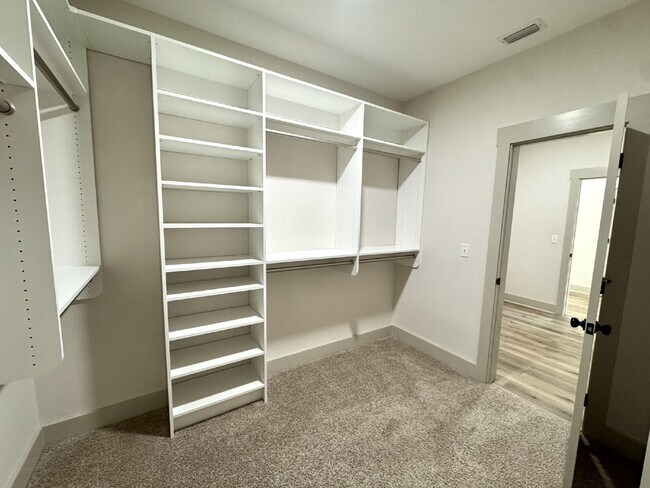 Building Photo - Need Space?  How about 5 bedrooms, 2.5 baths + an extra bonus area upstairs so that the kids can ...