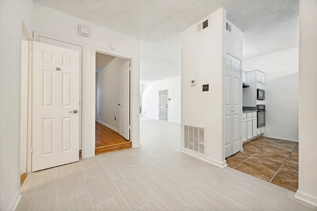 Building Photo - Spacious Dallas Condo with Unbeatable Storage, Private Patio & Carport