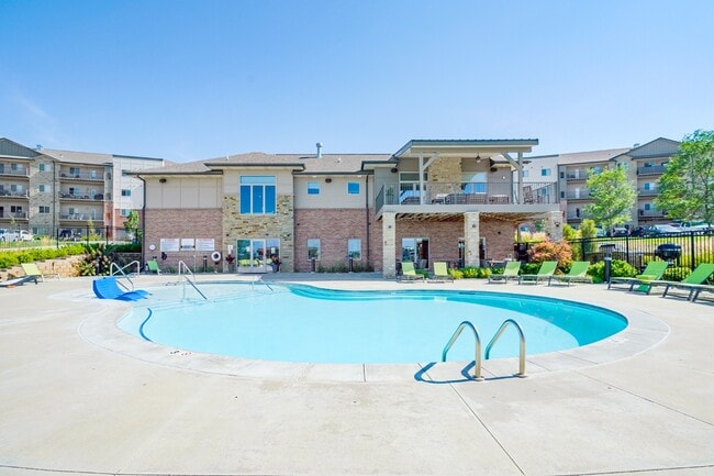 There's no better way to beat the heat than taking a dip in our resort-style pool. - The Flats at 84