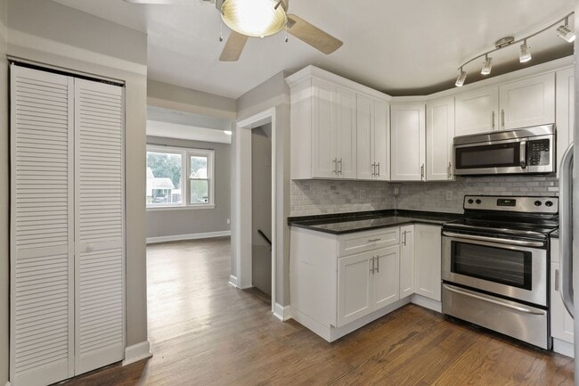 Building Photo - Move-In Ready Cape Cod with 3 Finished Levels & Huge Backyard