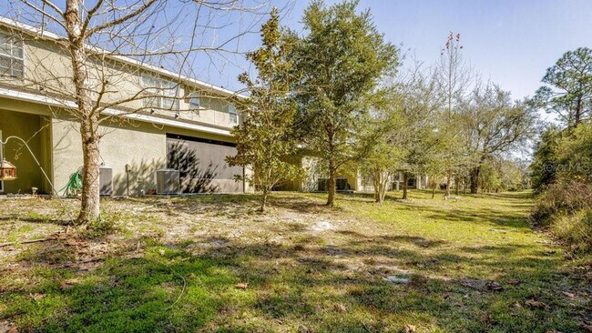 Building Photo - 3 Bedroom 3 Bath Kissimmee Emerald Lake Townhome with 2 Master Suites and Stainless Appliances!