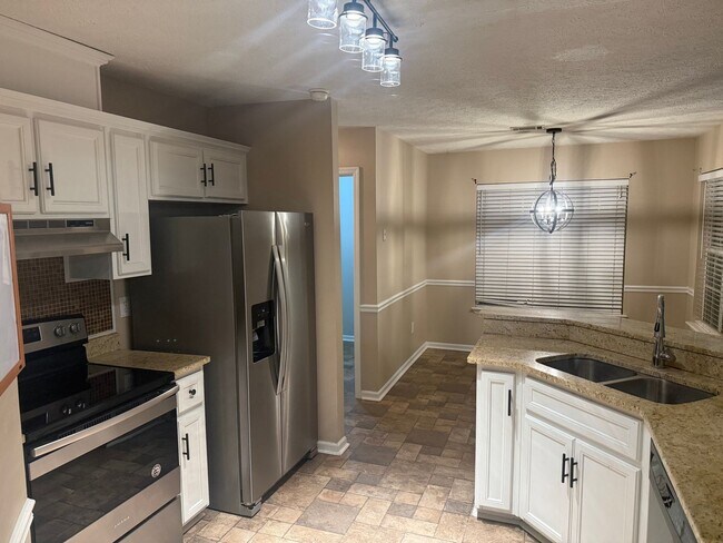 Building Photo - Closest 3bed/2bath to gate 2 available with Fenced in yard.