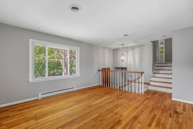 Building Photo - Large Home in Four Seasons Area, Hardwoods, Dining Room, Screed Porch, Fenced!