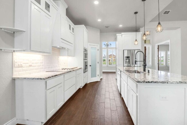 Building Photo - "Charming 4-Bed Oasis with Granite Touches & Cozy Fireplace in Floresville!"