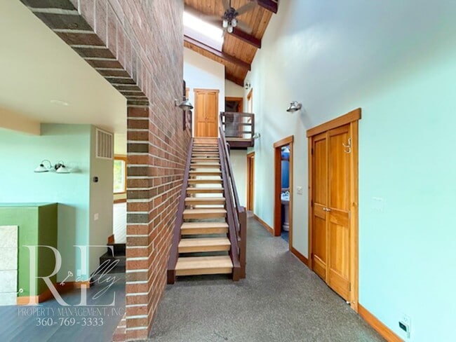 Building Photo - Waterfront Rustic Retreat with Vaulted Ceilings, Picture Windows & Lofted Nook