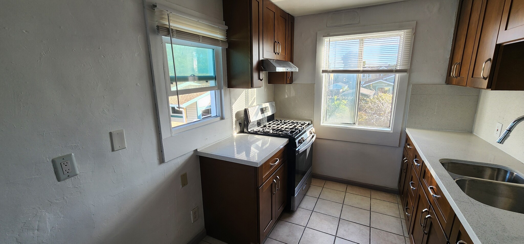 kitchen with marbel countertops and new stove - 1474 7th St