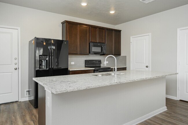 Building Photo - Spacious Townhome Available Now!