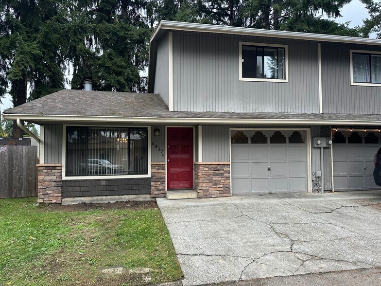 Front of property with built in garage - 6439 Armar Rd