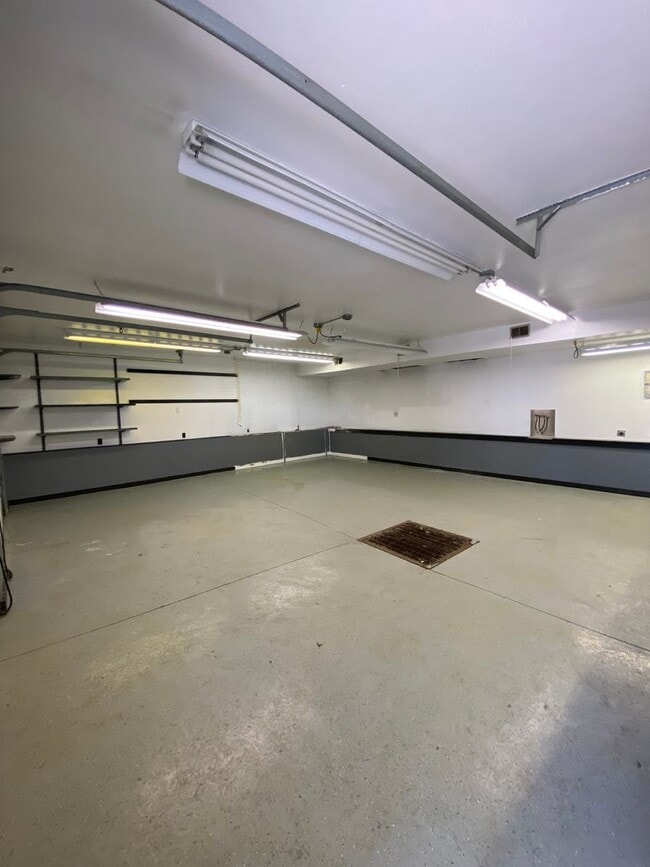 Building Photo - 1-Bedroom Home with 3-Stall Garage and Bonus Living Space