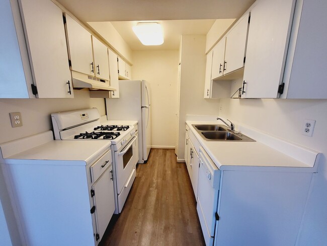 Building Photo - Your Lake View Condo is waiting for you in...