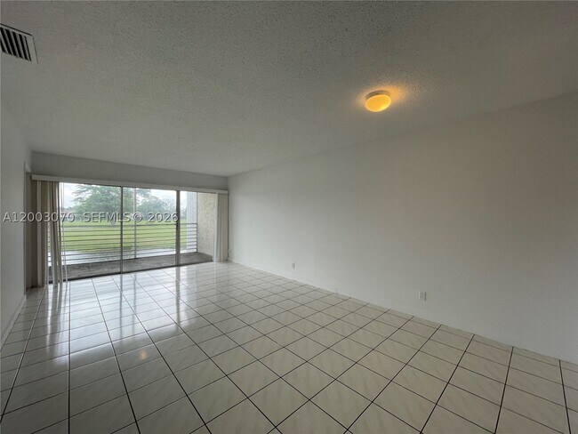 Building Photo - 7410 Woodmont Terrace