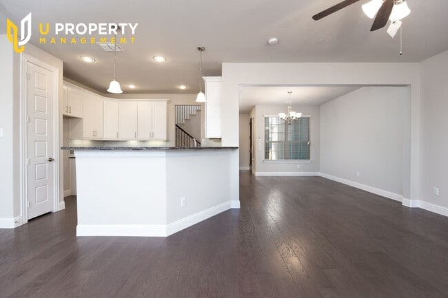 Building Photo - Luxury Townhome- wood flooring. Great location