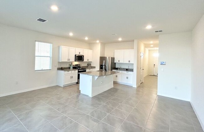 Building Photo - Brand New 3/2.5 Modern Townhome with a Lof...