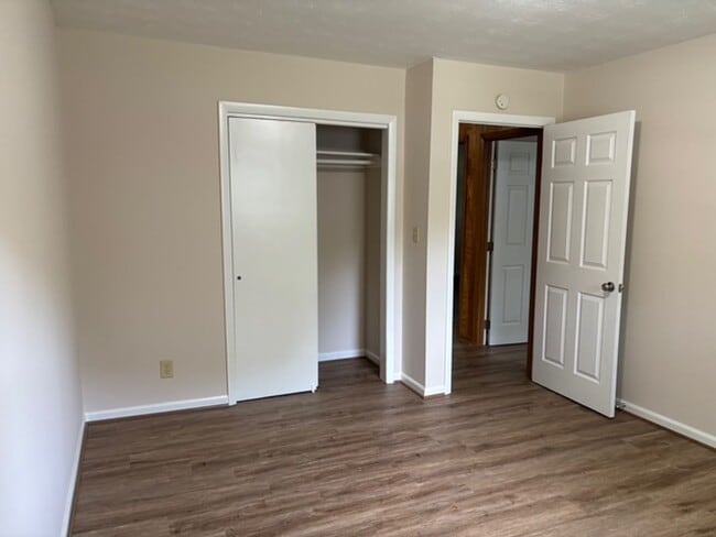 Building Photo - Nice brick home, single carport, storage b...