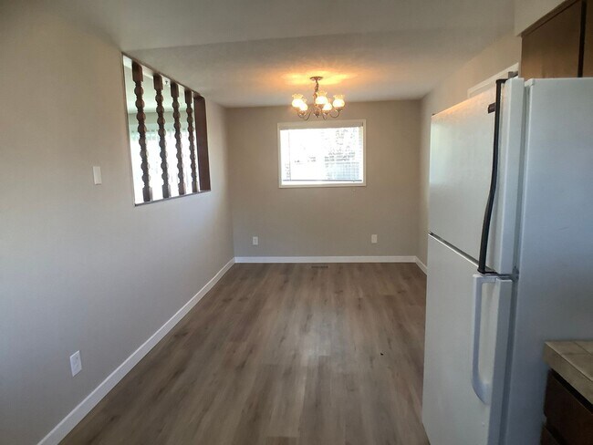 Building Photo - Three bedroom home with large yard| Available July!