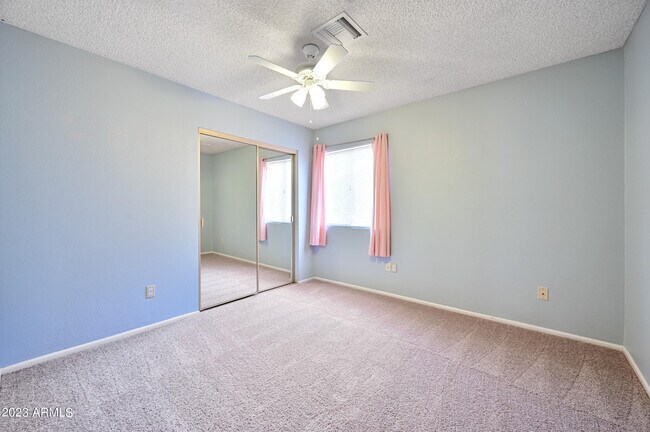 Building Photo - 6830 E Paradise Ln