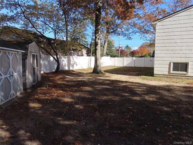 Building Photo - 1210 Smithtown Ave