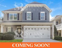 Building Photo - The living is easy in this lovely 5 bedroo...