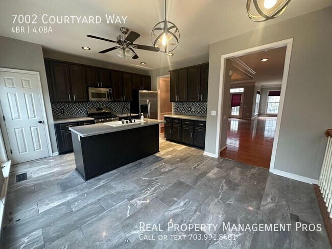 Building Photo - 7002 Courtyard Way
