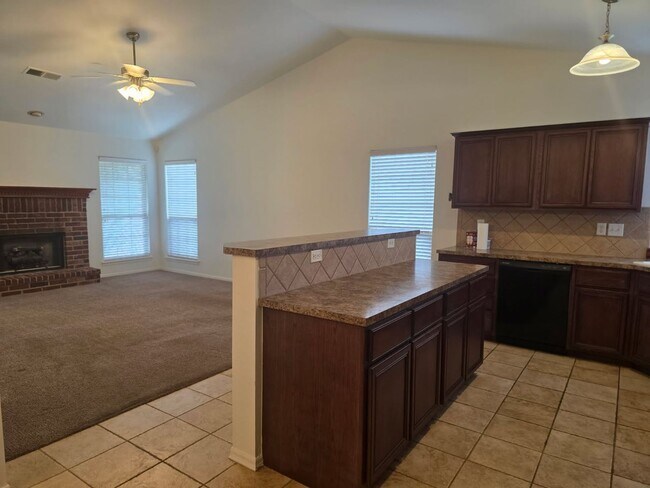 Building Photo - Come make this lovely 4 bedroom 2 bath, 2+...