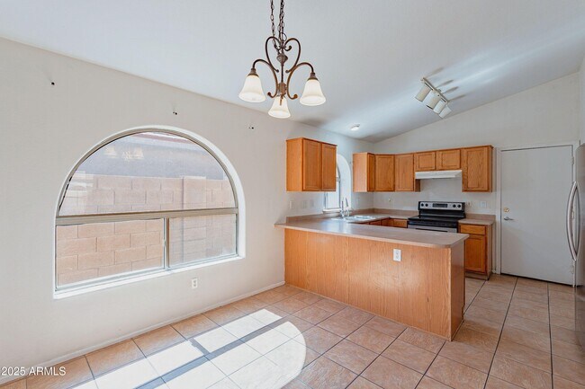 Building Photo - 43741 W Wade Dr
