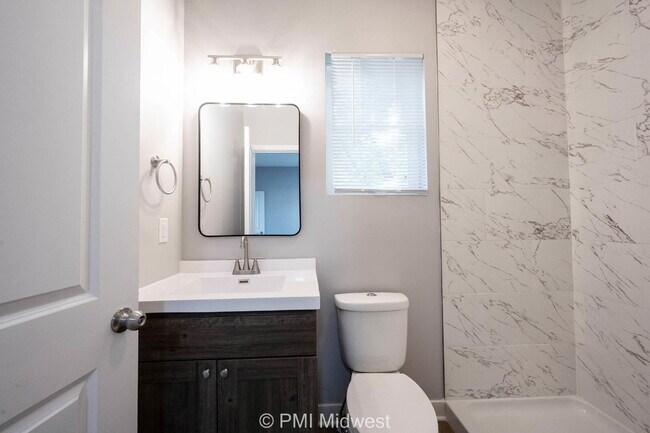 Building Photo - "Spacious & Modern 3-Bedroom Duplex on North Dexter Street – Your Perfect Indianapolis Retreat!"