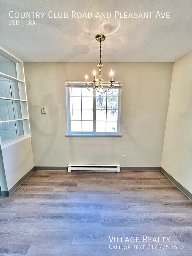 Building Photo - 605 Country Club Rd