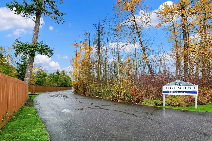 A private entrance setback from the road. - Edgemont