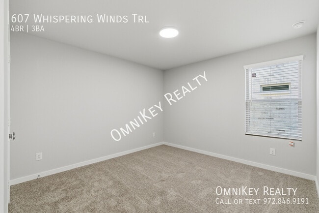 Building Photo - 607 Whispering Winds Trl