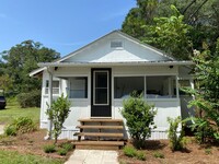 Building Photo - Partially Furnished Charming 4 Bedroom hom...