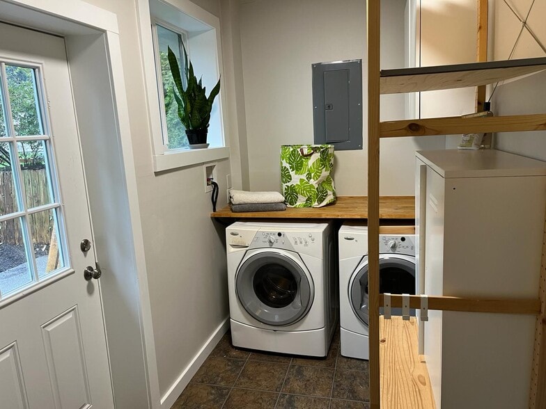 Laundry and Mud Room with Pantry Space - 22418 77th Ave W