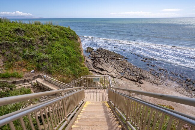 Building Photo - This Sunset Beach Estates Townhome will ha...