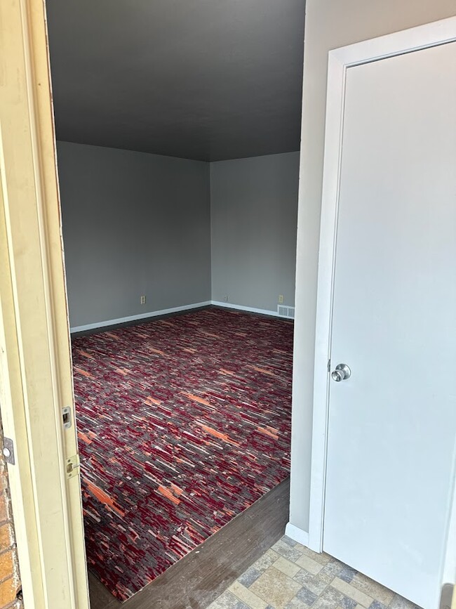 As you enter, coat closet - 10627 W Wabash Ave