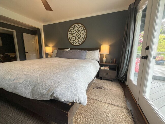 Building Photo - Spacious 4-Bedroom Home with Lush Landscap...