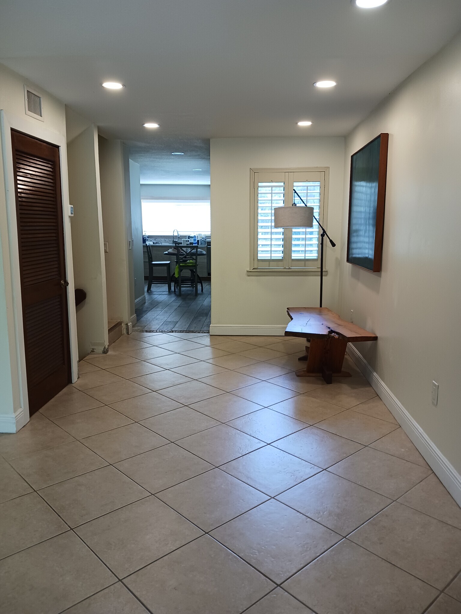 Stairs, powder room, kitchen off the dining area - 441 N Harbor City Blvd